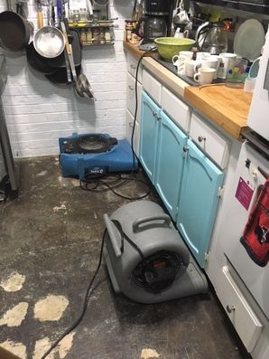Water damage in Whitt from appliance leak by RDS Fire & Water Damage Restoration